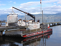 Okanagan Boat Lifts provide water transport on our barge. 